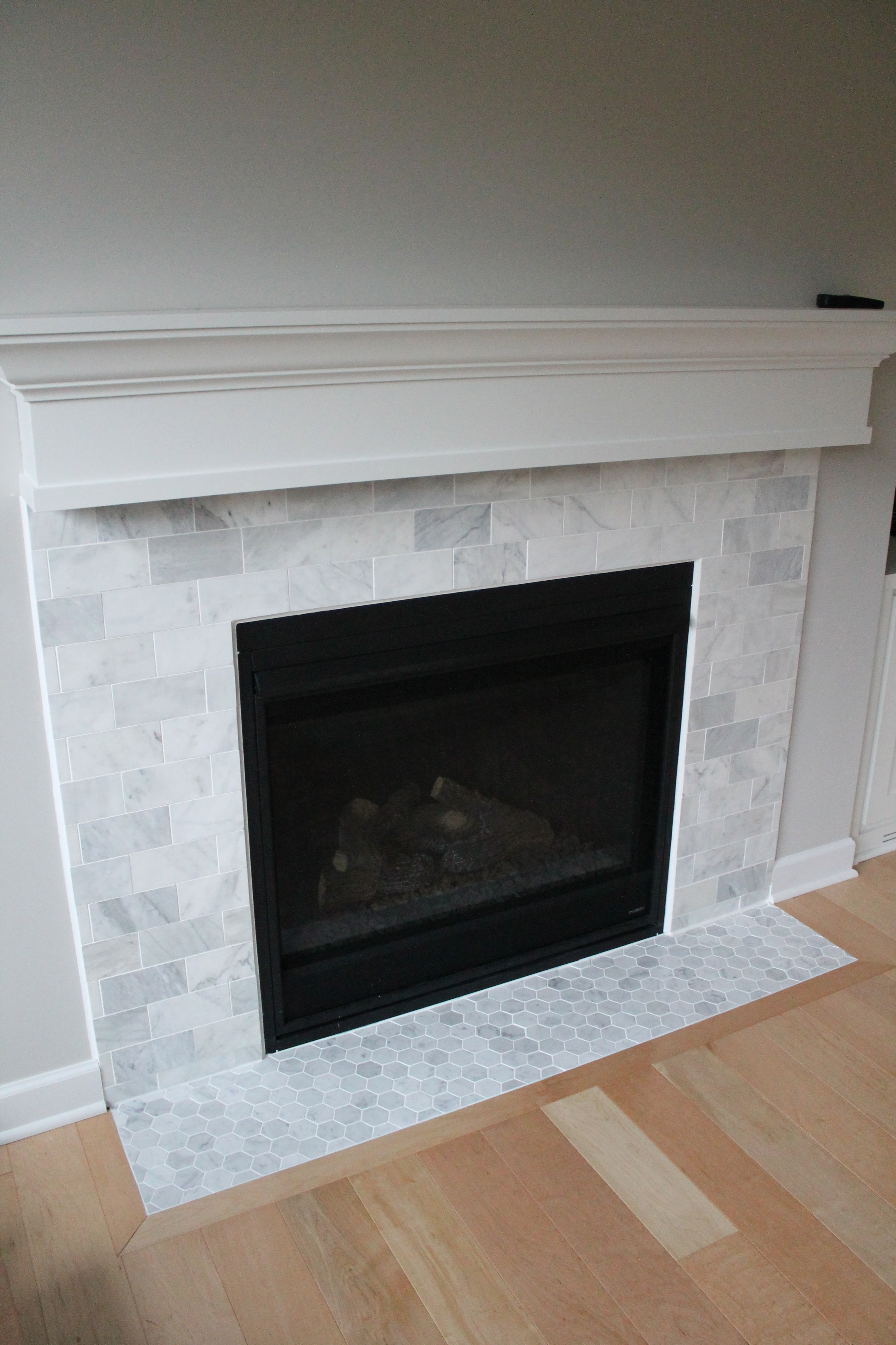 Carrara Marble Fireplace | construction2style
