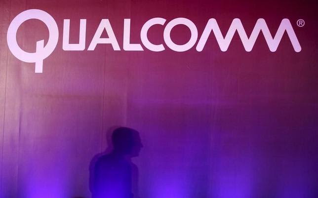 A shadow is cast near a Qualcomm logo at the 2015 Computex exhibition in Taipei, Taiwan, June 2, 2015. REUTERS/Pichi Chuang