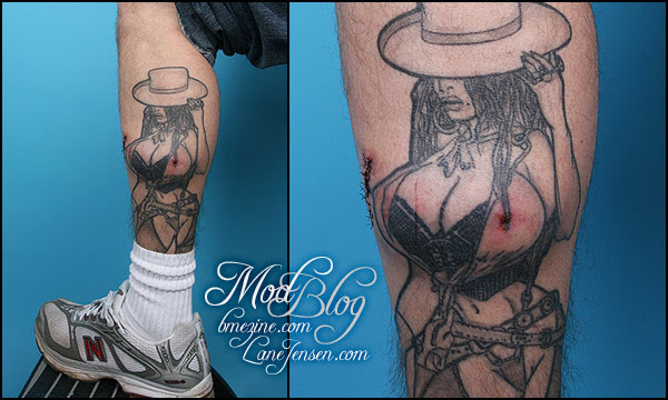 Breast implant tattoo