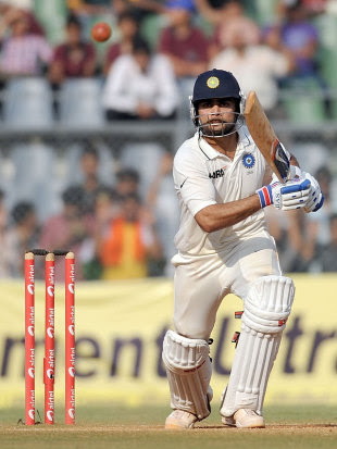 Virat Kohli hits one down the ground, India v West Indies, 3rd Test, Mumbai, 5th day, November 26, 2011 