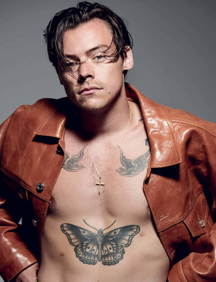 Female Tattoo With Butterfly Tattoo Design On The Right Upper Back