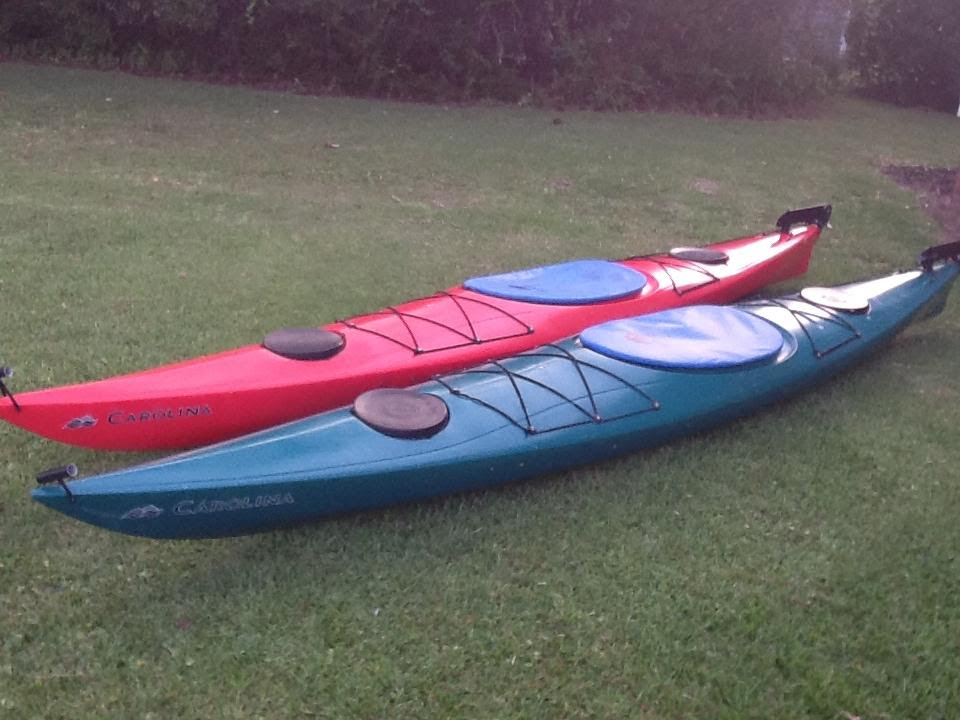 2 kayaks. two 14' carolina perception touring kayaks with