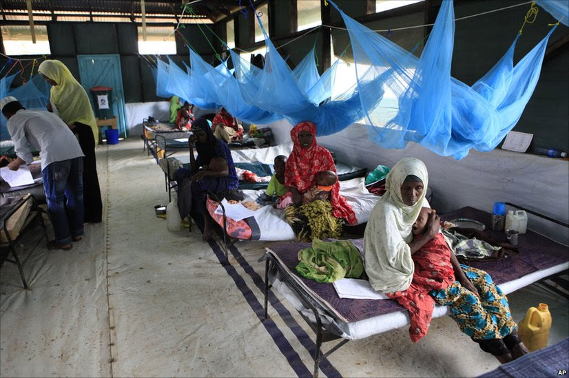 Somali parents care for their young children who are being treated for malnutrition, at a Doctors Without Borders hospital in Dagahaley Camp, outside Dadaab, Kenya.