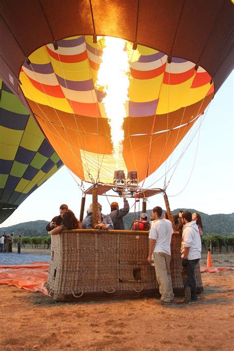 Check your local ad to verify prices. From solid ground, chase crews keep hot air balloons aloft