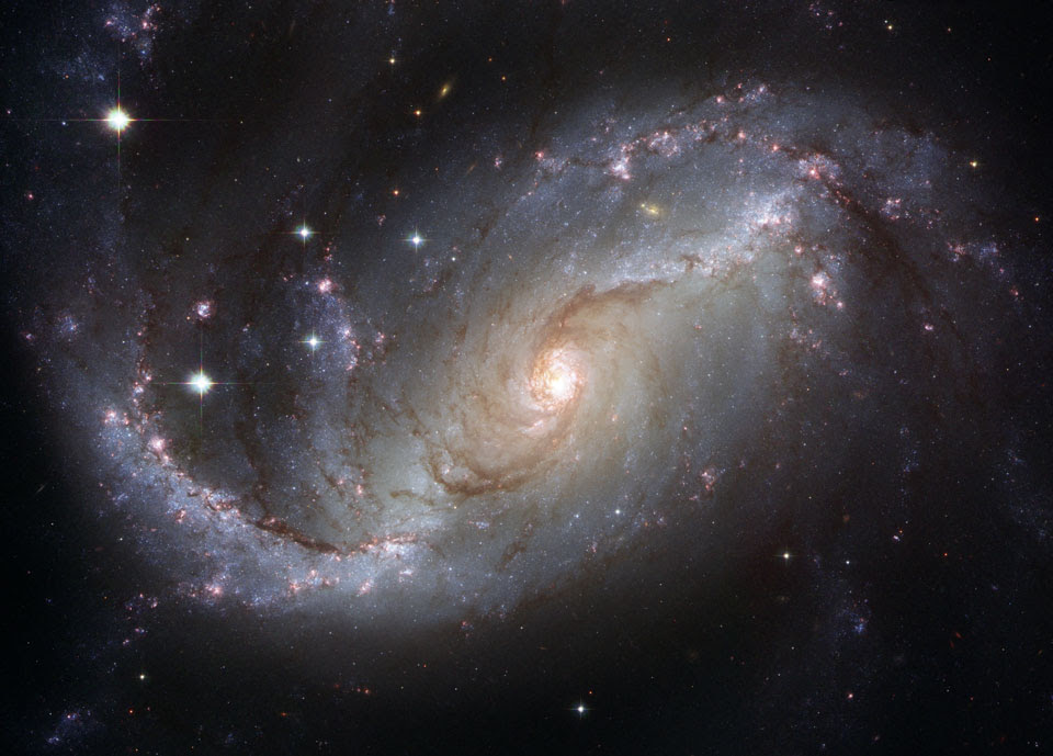http://apod.nasa.gov/apod/image/1205/ngc1672_hubble_960.jpg