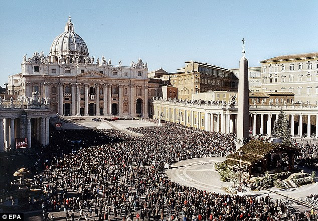 Thousands flock to St. Peter's Square in Rome every December to see the life-size nativity scene and hear the Pope's annual blessing (file picture) 