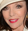 Mellow yellow: Joan Collins wears a striking ensemble as she attends the San Lorenzo 'Street is Culture' Event in London