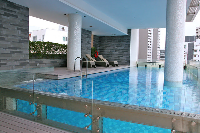 The glass-encased infinity pool is high up on the 12th floor