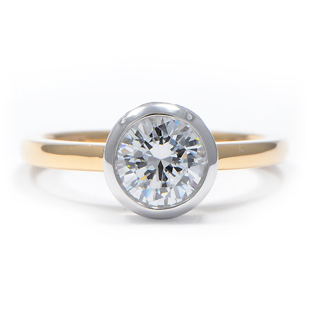 Two tone solitaire engagement rings