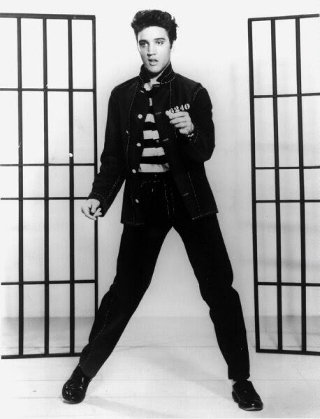 Elvis Presley in jail, a movie still from Jailhouse Rock, 1957