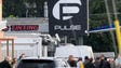 Orlando police officers gather outside of the Pulse