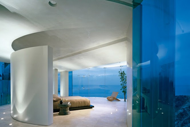 house surrounded by blue water