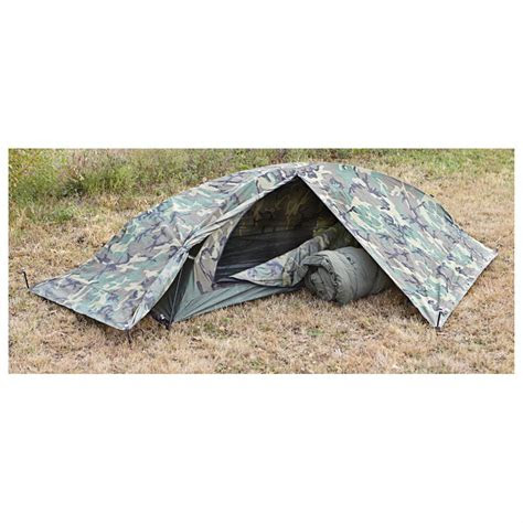 military surplus  man combat tent woodland