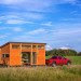 Escape Traveler, Kelly Davis, Dan George Dobrowolski, Escape cabin, Escape traveler tiny home, tiny home, RV, tiny house, mobile home, tiny mobile home, luxury tiny home, recycled Dakota planking, recycled materials, transforming furniture, sleeping loft, low-e windows,