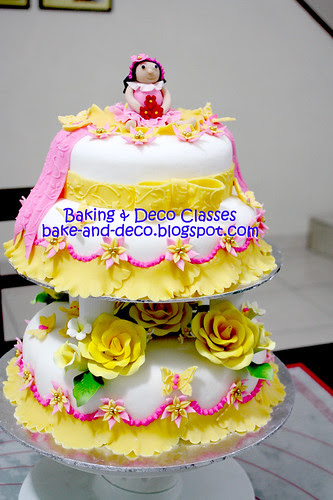 Three tier & stack fondant cake with figurines
