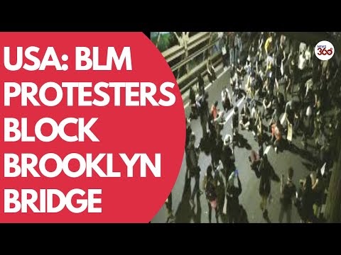 USA: BLM protesters block Brooklyn Bridge, demanding justice for Breonna...
