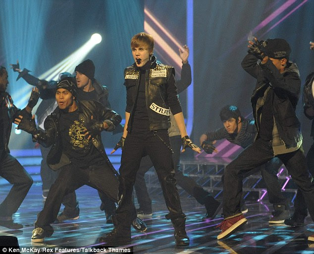 Fast mover: Justin performed a mash-up of two of his songs on last night's X Factor but appeared to mime for most of it to concentrate on dancing 