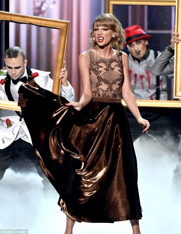 Headed for Broadway? Taylor certainly looked like a star of stage and screen as she put on a theatrical performance 