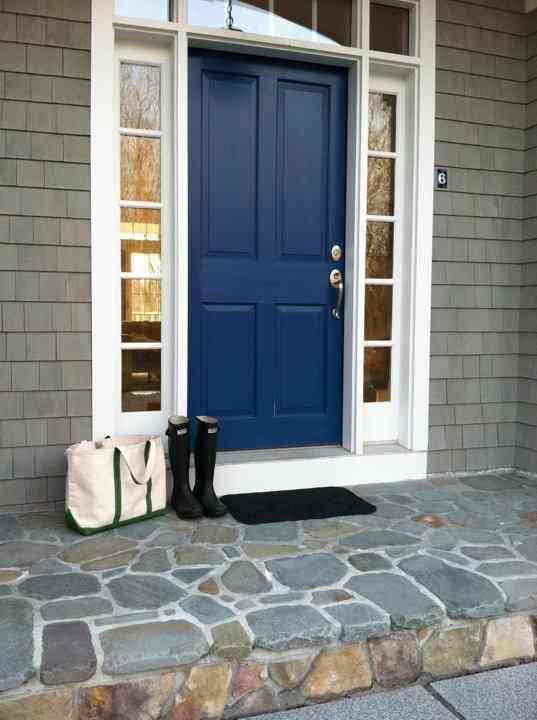 Front door. gray house, nautical blue door