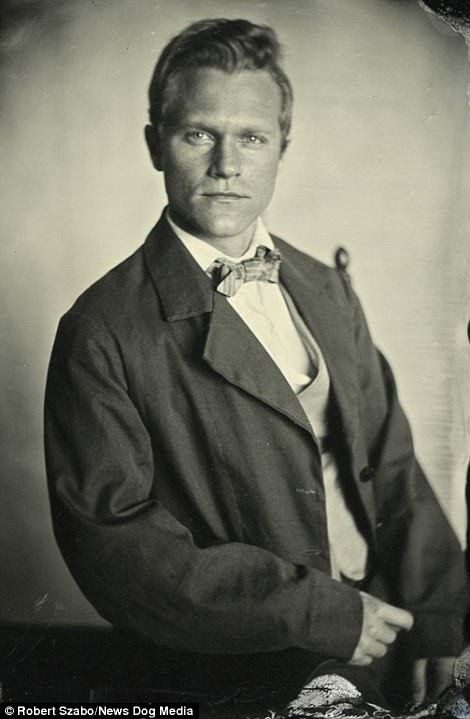 Robert uses a camera that was around during the American Civil War, which took place from 1861 to 1865 after a long-standing controversy over slavery and states' rights