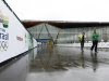 Brazilian sports staff walk outside the Crystal Palace National Sports Centre in south London