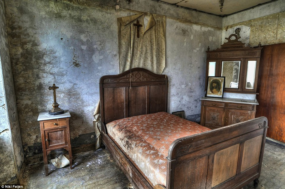 Mould: Beds feature heavily in the Disciple of Decay series, as do religious pictures and crosses