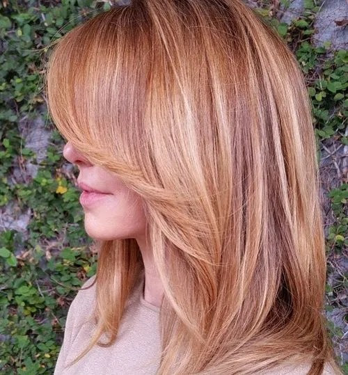 layered strawberry blonde hair with highlights