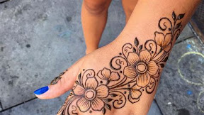 Stunning Henna Designs Inspired by Nature's Beauty: Flower Tattoos for Every Occasion