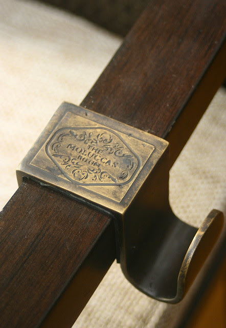 I love the bag hooks, embossed with the restaurant logo