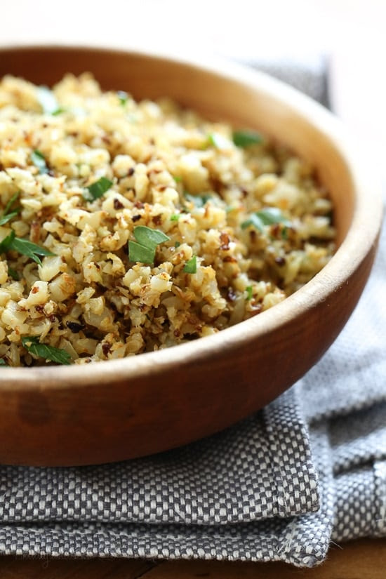 I love cauliflower "rice", and I love roasted cauliflower so I combined the two to make this easy low-carb side dish that goes great with just about anything from chicken, to steak or fish.