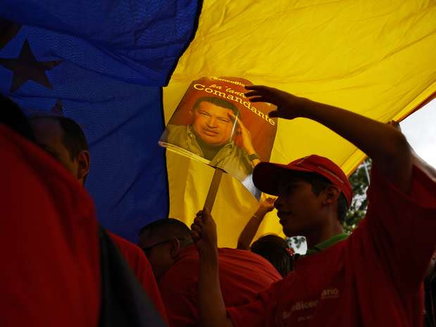Milhares de pessoas participaram de atos para lembrar o aniversário de 55 anos da democracia na Venezuela Foto:  / AFP