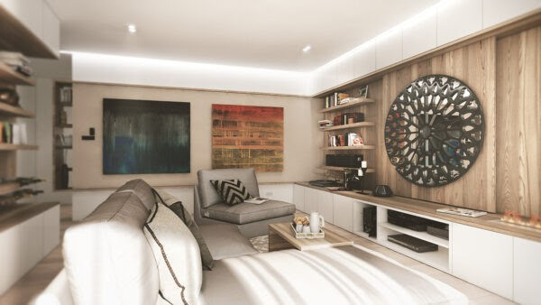 The second space is much lighter and cooler in color, though its use of wood is just as prominent. The artistic space takes on a much more contemporary feel with a sliding wood panel covering up a flat panel television and wood virtually growing out of the floors to create a desk area, shelving, and decorative display nooks. The patterns used in contrast to the natural wood elements definitely give this space a Scandinavian feel as well.