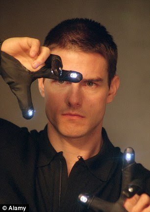 Pinć's rings work in a similar way to the gloves used by Tom Cruise in film Minority Report (pictured)