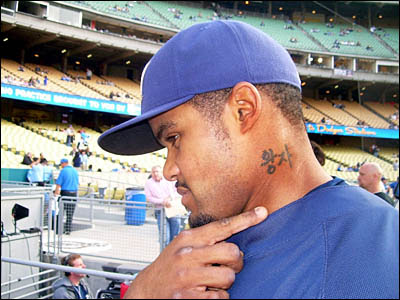 tattoos on the neck for men. Neck Tattoos – Choosing Neck Tattoos For Men