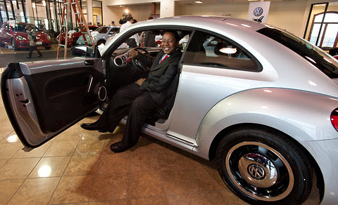 Leonardo Gilbert, on Thursday, collecting one of the 276 Volkswagen Beetles promised to audience members at Oprah Winfrey's "Ultimate Favorite Things" show taping last November.