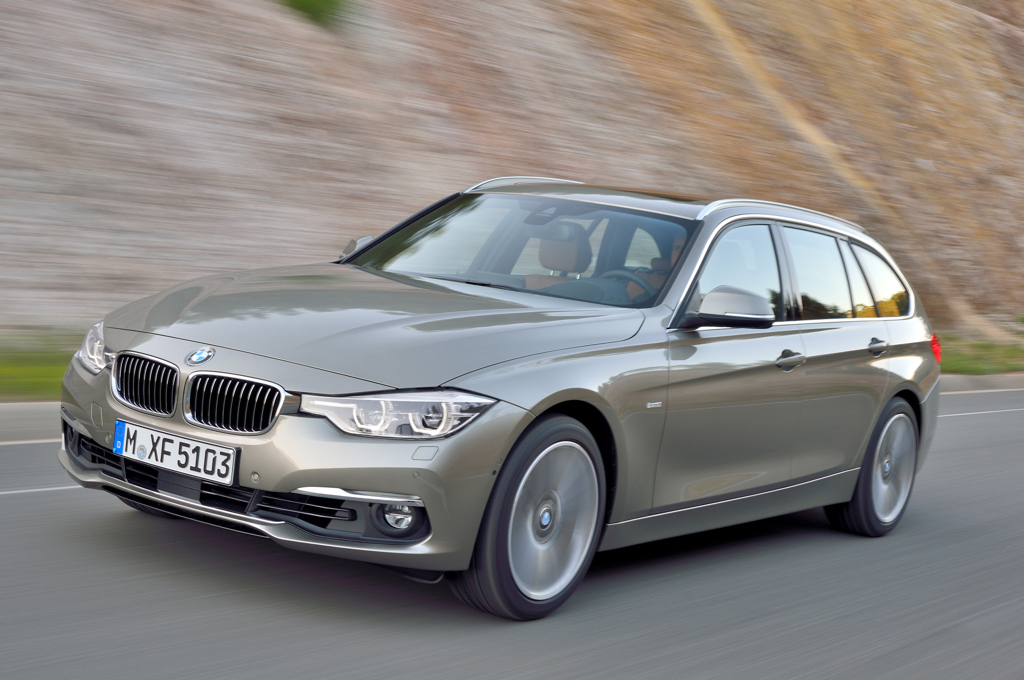 2016 BMW 3 Series Sport Wagon front three quarter in motion