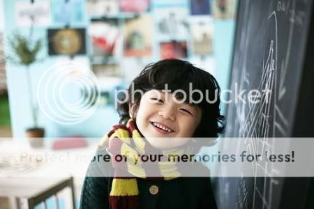 And I see this little boy with rollers in his hair watching Inkigayo 