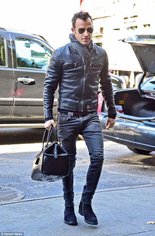 ... rocked the look in his leather jacket, designer jeans and suede boots ... rocked the look in his leather jacket, designer jeans and suede boots