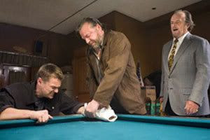 Billy Costigan (Leonardo DiCaprio) gets interrogated by one of Frank Costello's (Jack Nicholson) goons.