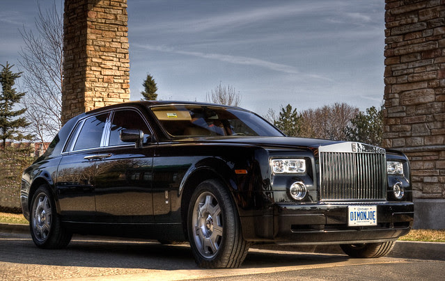 A Rolls Royce Phantom parked with it's Spirit of exstasy ornament retracted. Why not? A Rolls Royce Phantom parked with it's Spirit of exstasy ornament retracted. Why not?