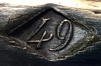 The production year marking on silver-plated Christofle cutlery between c.1844 and c.1859