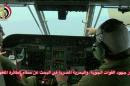An Egyptian pilot points during a search operation by Egyptian air and navy forces for the EgyptAir plane that disappeared in the Mediterranean Sea, in this still image taken from video