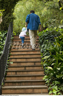Father and Daughter Climbing Stairs    Stock Photo - Premium Rights-Managed, Artist: Peter Griffith, Code: 700-00549953