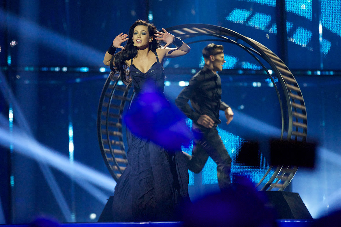 Mariya Yaremchuk of Ukraine performs on stage with a man in a giant hamster wheel during the first semi final of the Eurovision Song Contest 2014 in Copenhagen, Denmark.