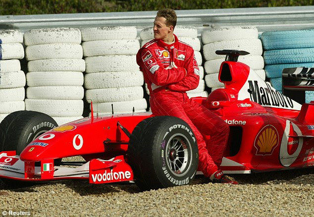 The greatest? Schumacher sits on his Ferrari after spinning off the track at Jerez during a training session in 2003