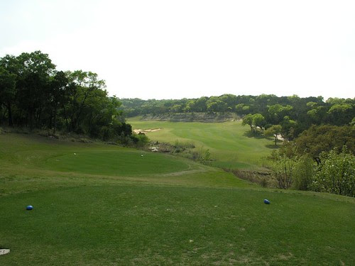 a wee par 4 - I shot a five - hole is  out and up to the left