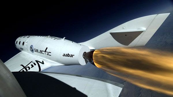 Above the Mojave Desert in California, SpaceShipTwo fires its engine for the first time on April 29, 2013.