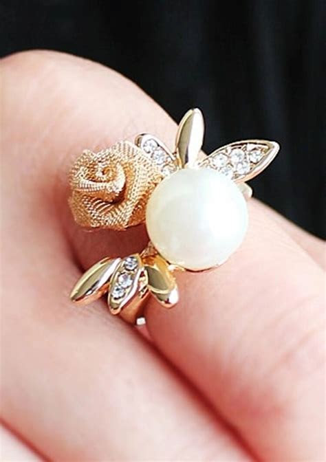 I'm working on a simple little design for a present where i have this cheap gold plated signet ring and i'm going to be taking a small portion of those spiral shavings from a piece of brass stock and creating an archimedean spiral pattern w. Gold Diamond Flower Pearl Ring | SHEIN USA