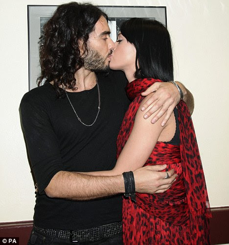 A very public display of affection Katy Perry and Russell Brand pucker up