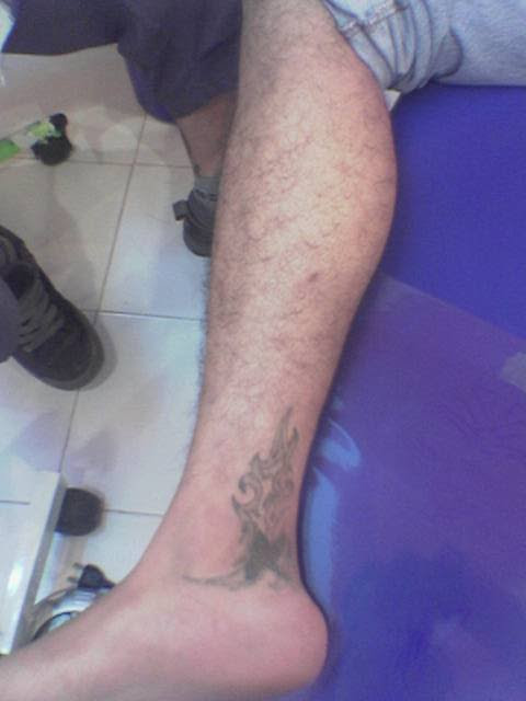 Notice the smallish tattoo on my ankle. I was not enjoying it.